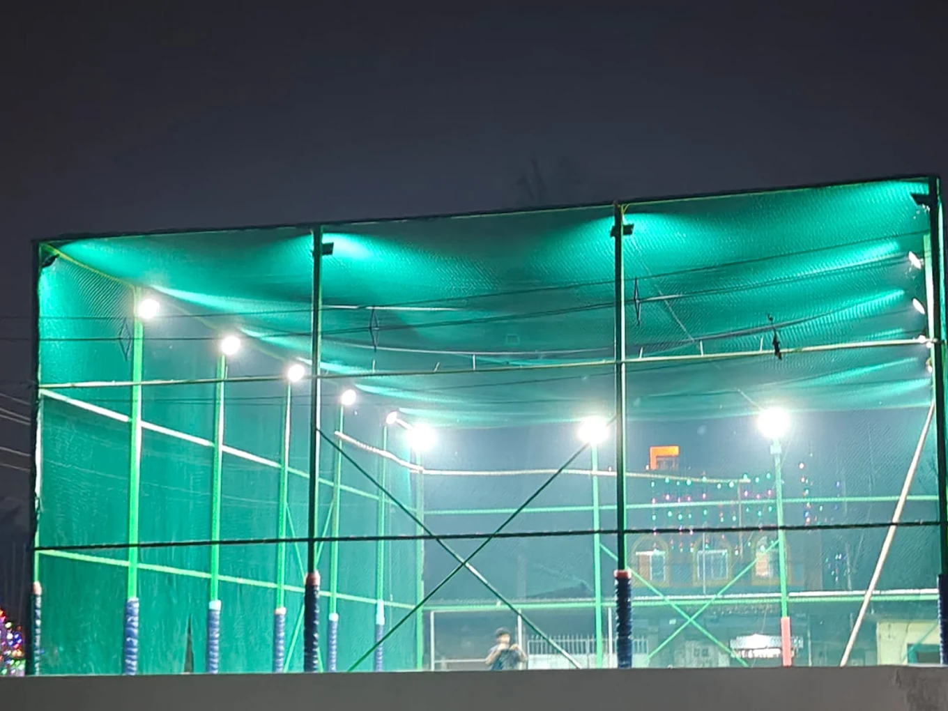 Illuminated turf netting and lights